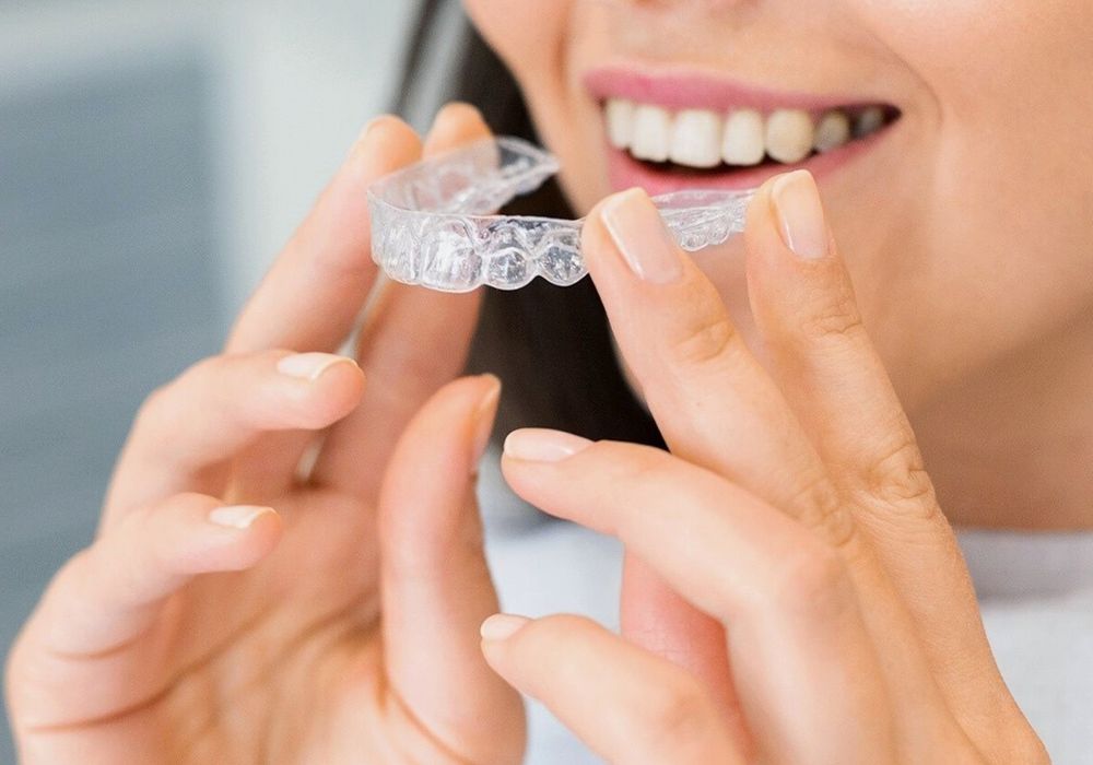 A close-up of straight, even teeth after orthodontic treatment